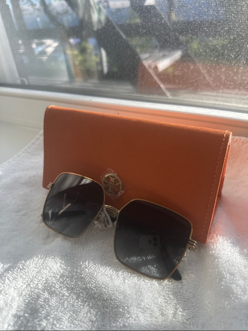Tory Burch Gold Frame Sunglasses with Gradient Black Lenses and Orange Case